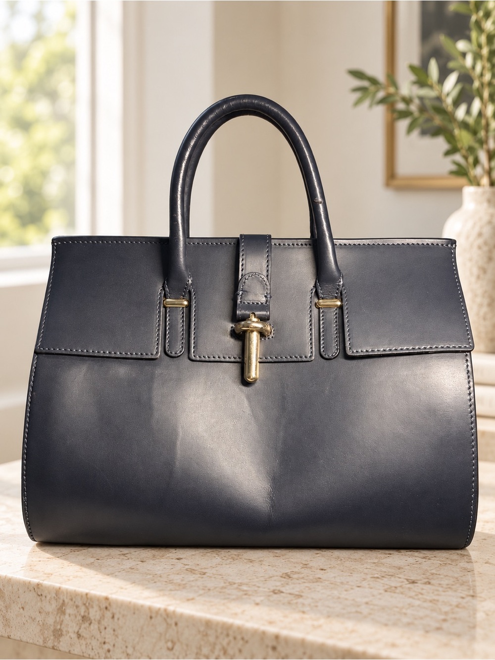 Structured Leather Satchel Handbag in Navy with Gold-Tone Accent Tube M Round